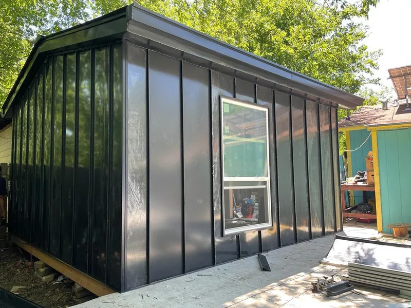 Black standing seam metal wall panels for Roof Inspection in Poulsbo