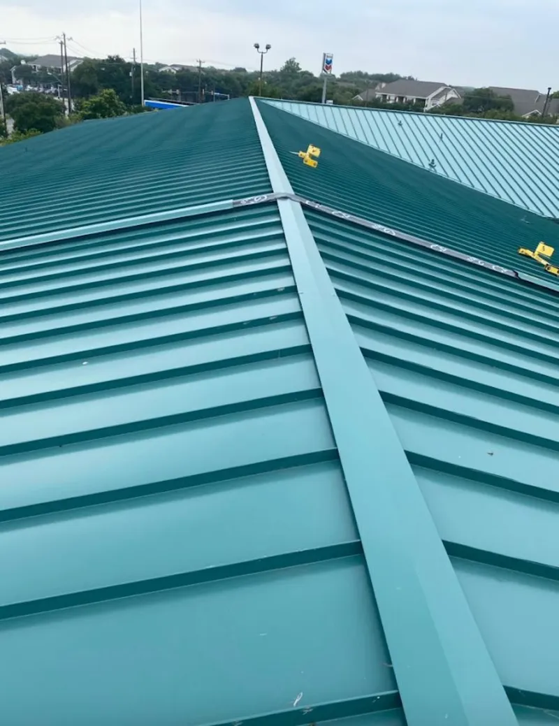 Green commercial metal roof ridge and valley for Metal Roof Repair in Poulsbo